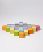Loose Grimm's wooden pastel cubes made into a diamond shape