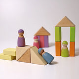 Creative play set up using the Grimms pastel duo wooden block set