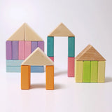 Simple house structures made from wooden blocks from the Grimms pastel duo set