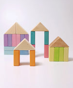 Simple house structures made from wooden blocks from the Grimms pastel duo set