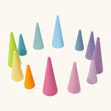 Grimms set of 12 tall and short wooden cone shaped pieces in a pastel palette. Perfect for learning games and building