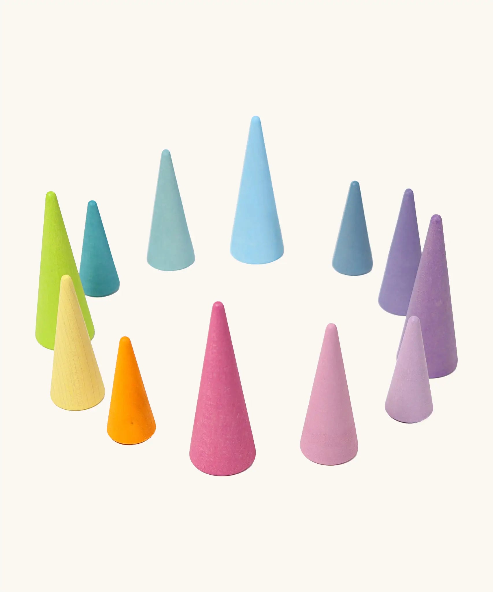 Grimms set of 12 tall and short wooden cone shaped pieces in a pastel palette. Perfect for learning games and building