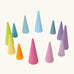 Grimms set of 12 tall and short wooden cone shaped pieces in a pastel palette. Perfect for learning games and building