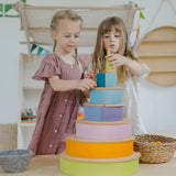 Children stacking wooden arch and Grimms natural semi circles pieces