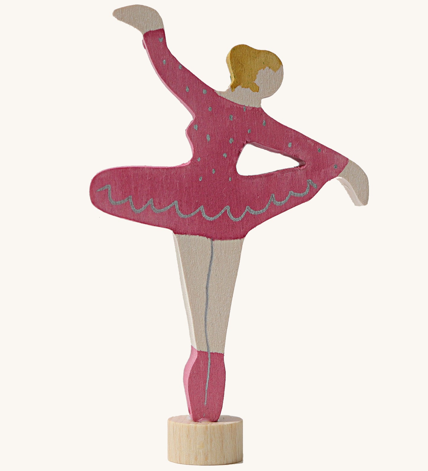 A Grimms pink ballerina decorative figure. Features a small base stand on the bottom to slot into a decorative figure