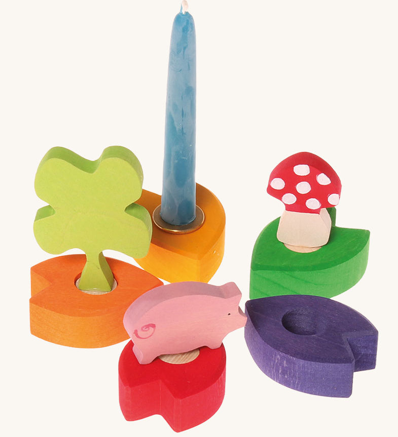 Various decorative figures shown on celebration ring pieces. These Waldorf inspired decorative figures are part of a wide range of wooden decorations for celebration rings available here at Babipur.
