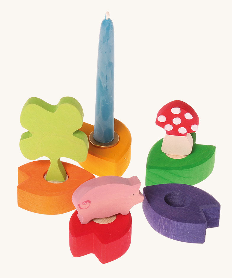 Various decorative figures shown on celebration ring pieces. These Waldorf inspired decorative figures are part of a wide range of wooden decorations for celebration rings available here at Babipur.