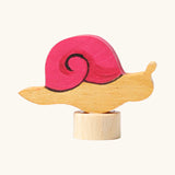 Side of the Grimms handcrafted wooden snail with pink shell decorative figure for the celebration ring or spiral