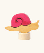 Side of the Grimms handcrafted wooden snail with pink shell decorative figure for the celebration ring or spiral
