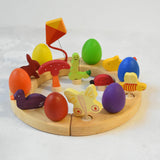A Grimm's wooden celebration with a rabbit, kit, fish, bee, ladybird, butterfly worm , duck and mushroom decorative figures