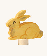 Grimm's Sitting Rabbit Decorative Figure. These Waldorf inspired decorative figures are part of a wide range of wooden decorations for celebration rings available here at Babipur.