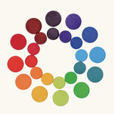 Grimm's wooden coins in a rainbow palette. Perfect for learning and counting games