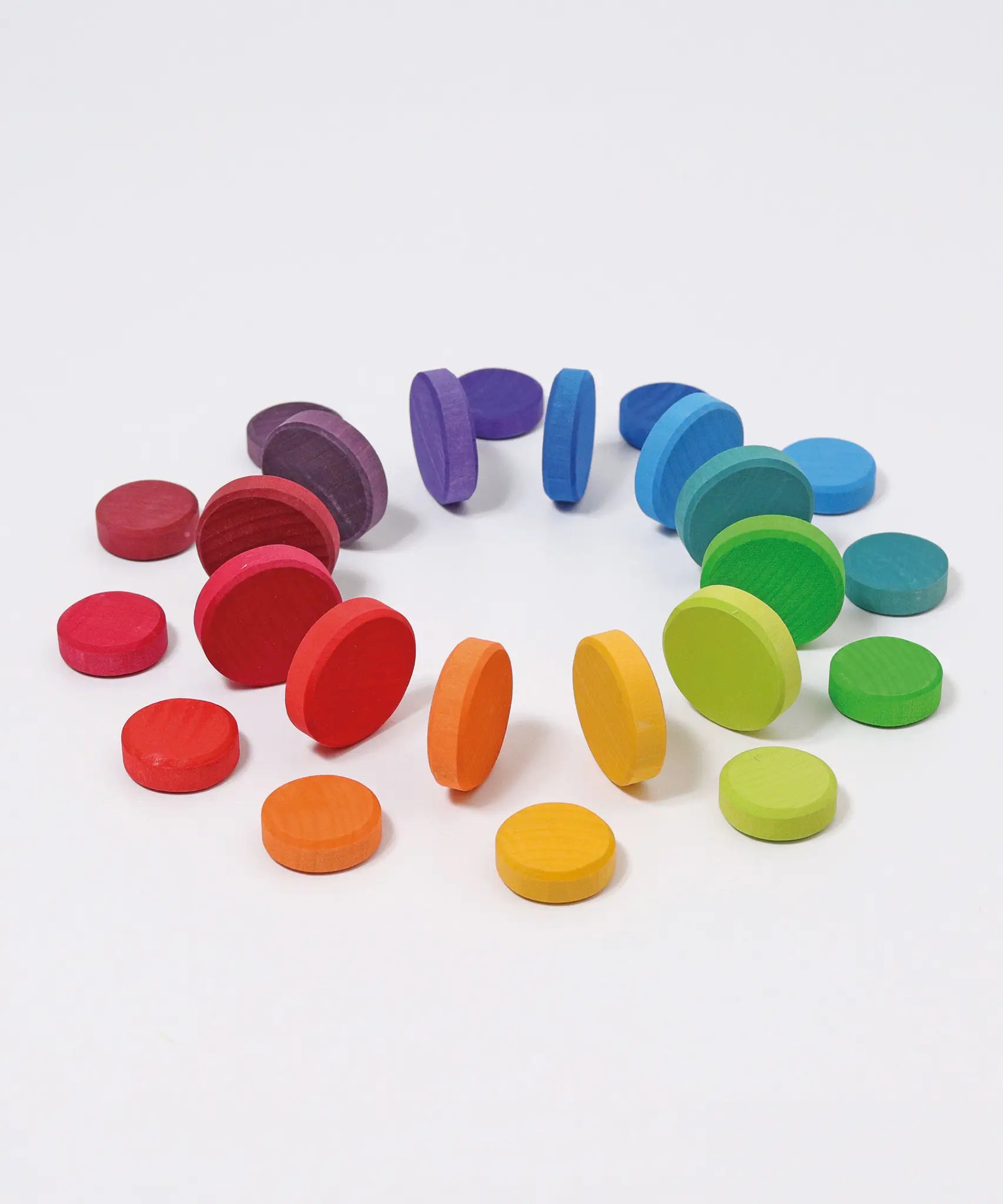 Grimms large and small wooden coins, perfect for learning and creative play 