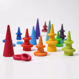 Grimms handcrafted wooden forest and building ring pieces in a rainbow palette. Made or sorting and small world play