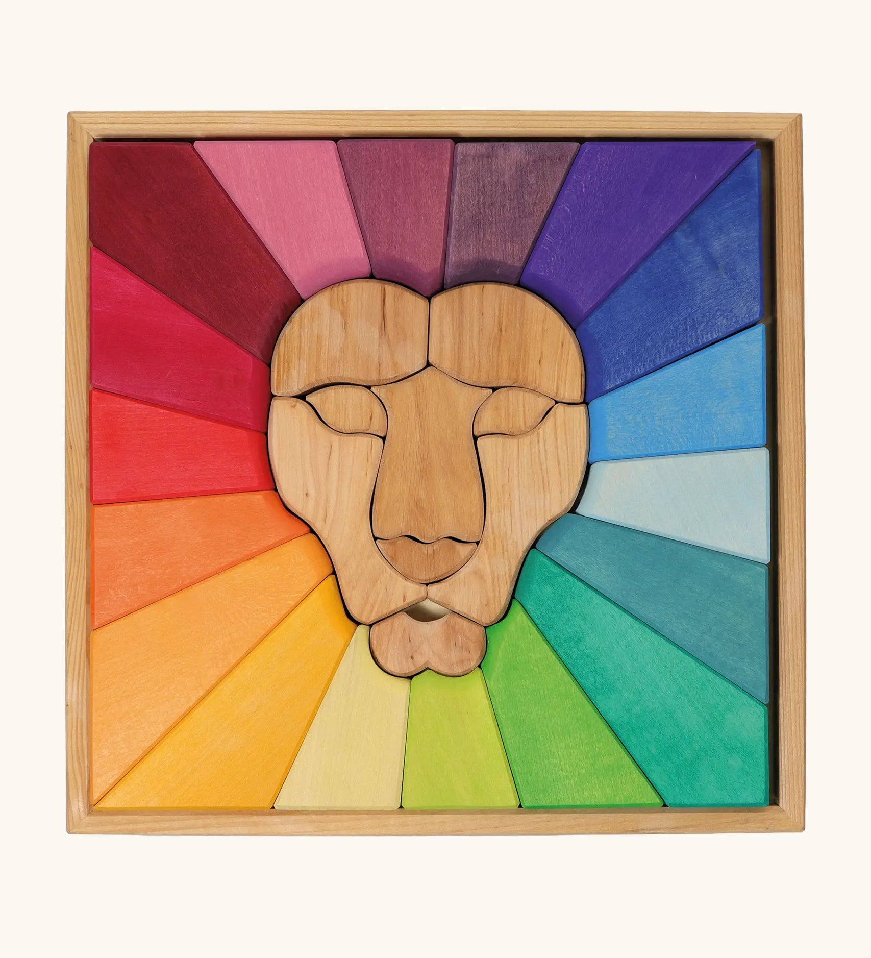Grimm's rainbow lion wooden building blocks set in a wooden storage display tray.