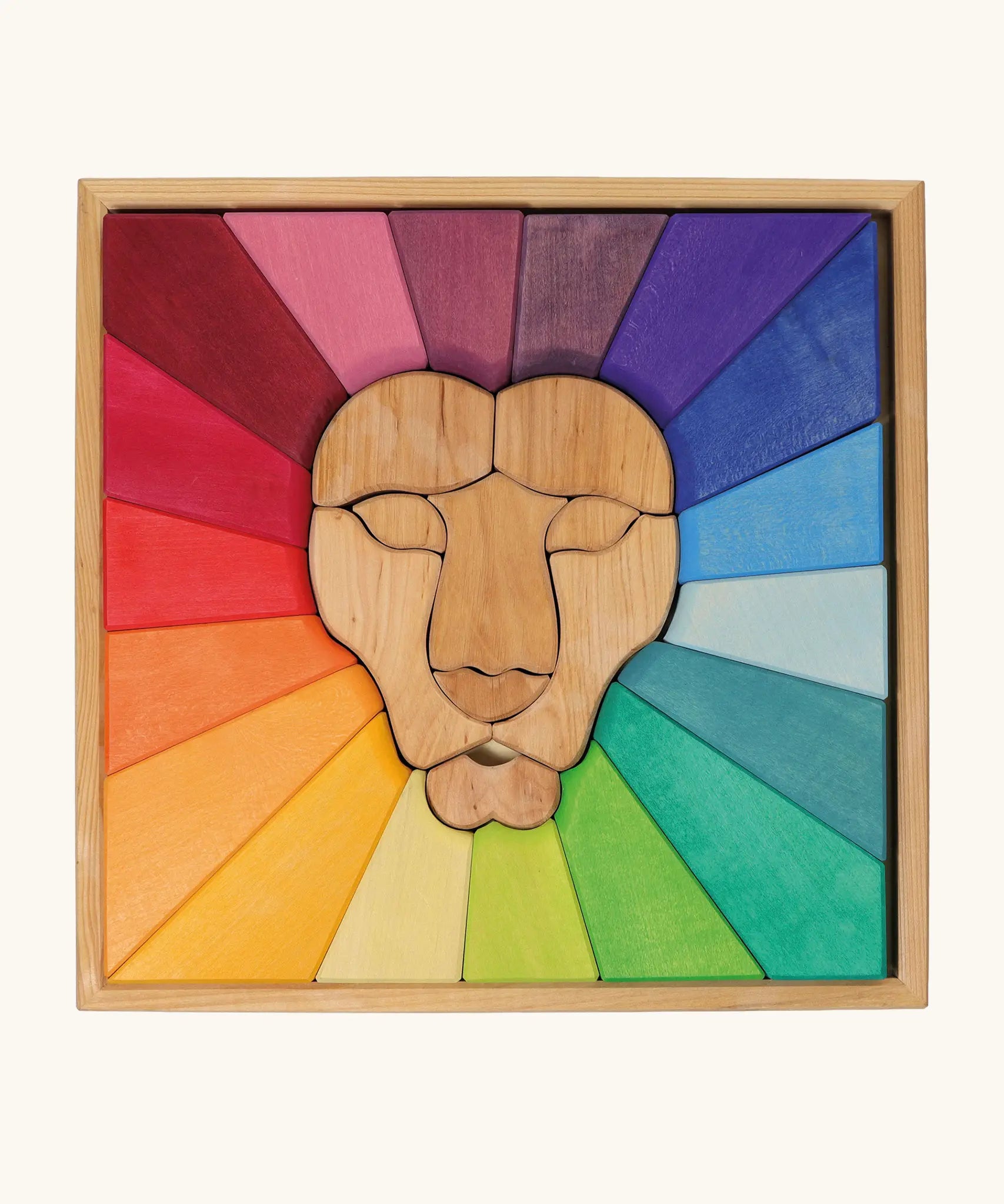 Grimm's rainbow lion wooden building blocks set in a wooden storage display tray.