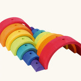 Grimm's rainbow stacking tower. 2 7-piece rainbows shown next to each other.