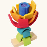 Grimm's rainbow stacking tower. 2 7-piece rainbows on a stacking pole.