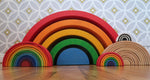Grimm's Giant Rainbow with large, 6 piece and mini rainbows placed in front of them.