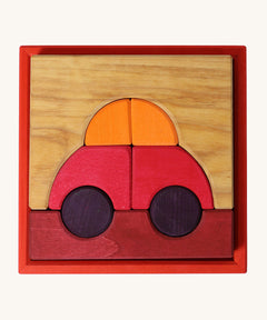 Grimm's red building set. A set of red, purple and natural wooden blocks that create a car shape when placed into the red coloured wooden storage tray that it comes with. These Grimm's toys are part of a wide range of wooden toys available here at Babipur. 