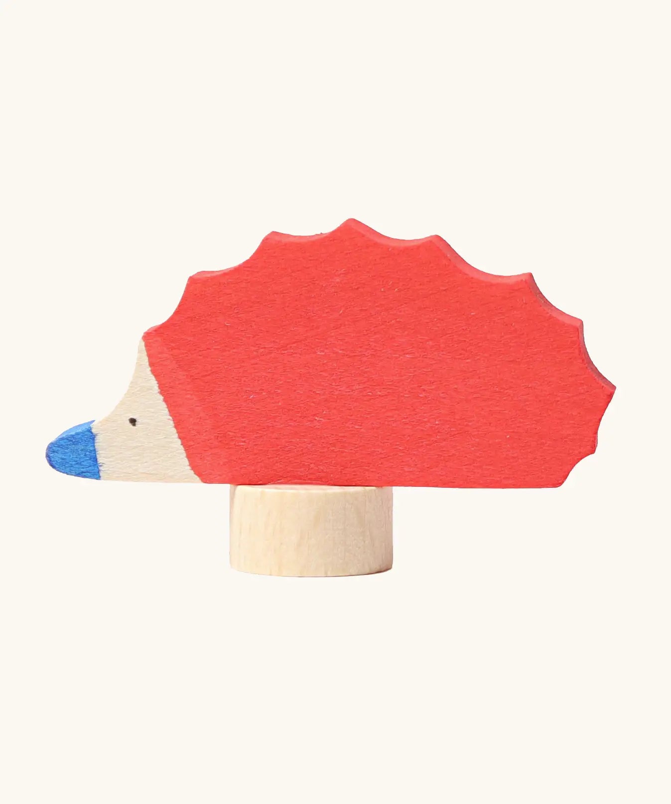 Grimm's handcrafted wooden red hedgehog decorative figure with a unpainted stand 
