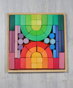 Grimm's large Romanesque wooden building block set in a wooden storage display tray.