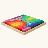 Grimm's large Romanesque building set in a wooden storage display tray.