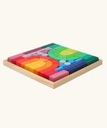 Grimm's large Romanesque building set in a wooden storage display tray.
