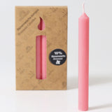 Grimm's Old Rose 10% Beeswax Candles in a 12 Pack with a single candle taken out of the box and placed at the front. 