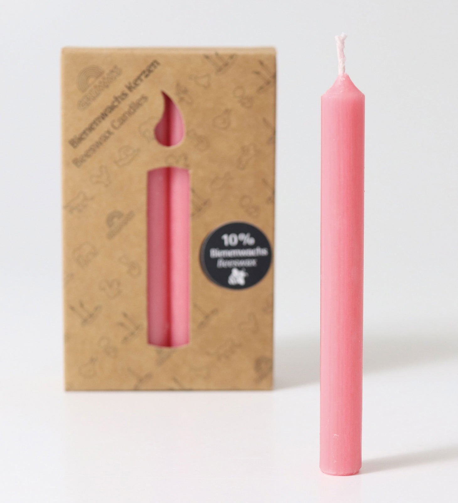 Grimm's Old Rose 10% Beeswax Candles in a 12 Pack with a single candle taken out of the box and placed at the front. 