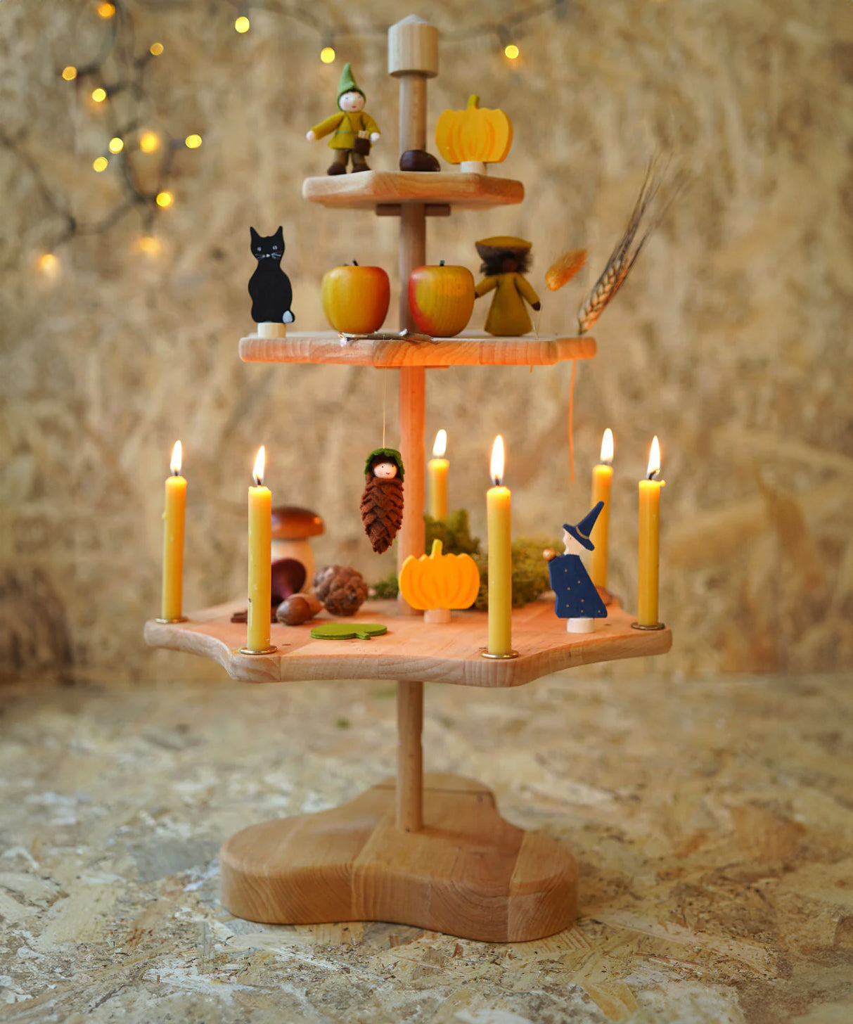 A Grimm's Seasonal Festivity Stand decorated with Autumn and Halloween themed items. 