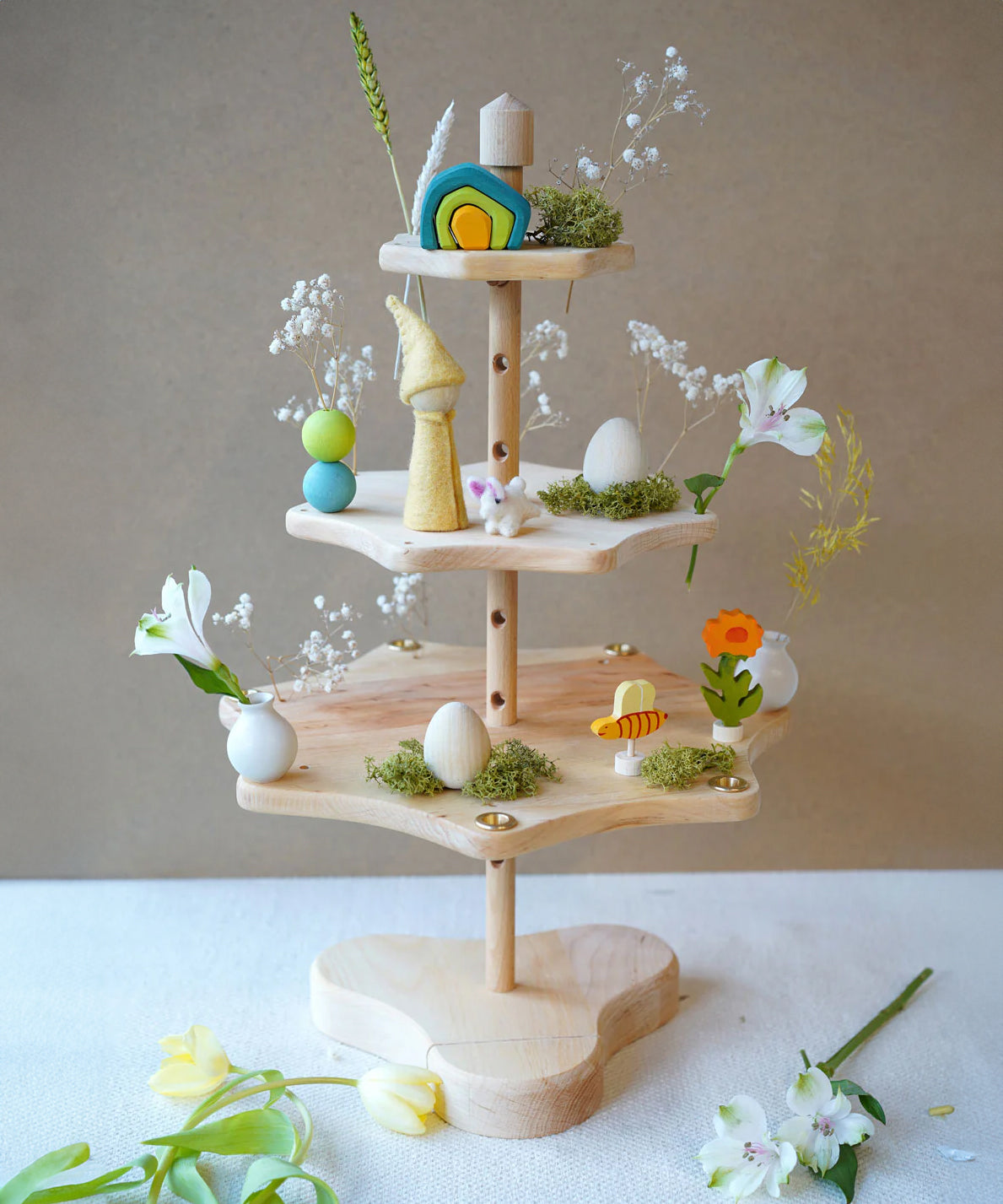 A Grimm's Seasonal Festivity Stand decorated with Spring themed items. 