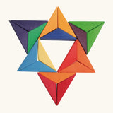 A abstract shape flatlay using pieces from the Grimms star complementary set. 