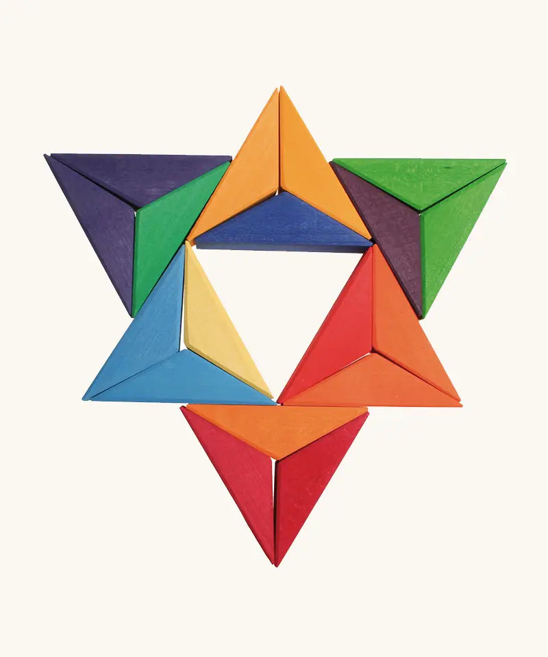 A abstract shape flatlay using pieces from the Grimms star complementary set. 