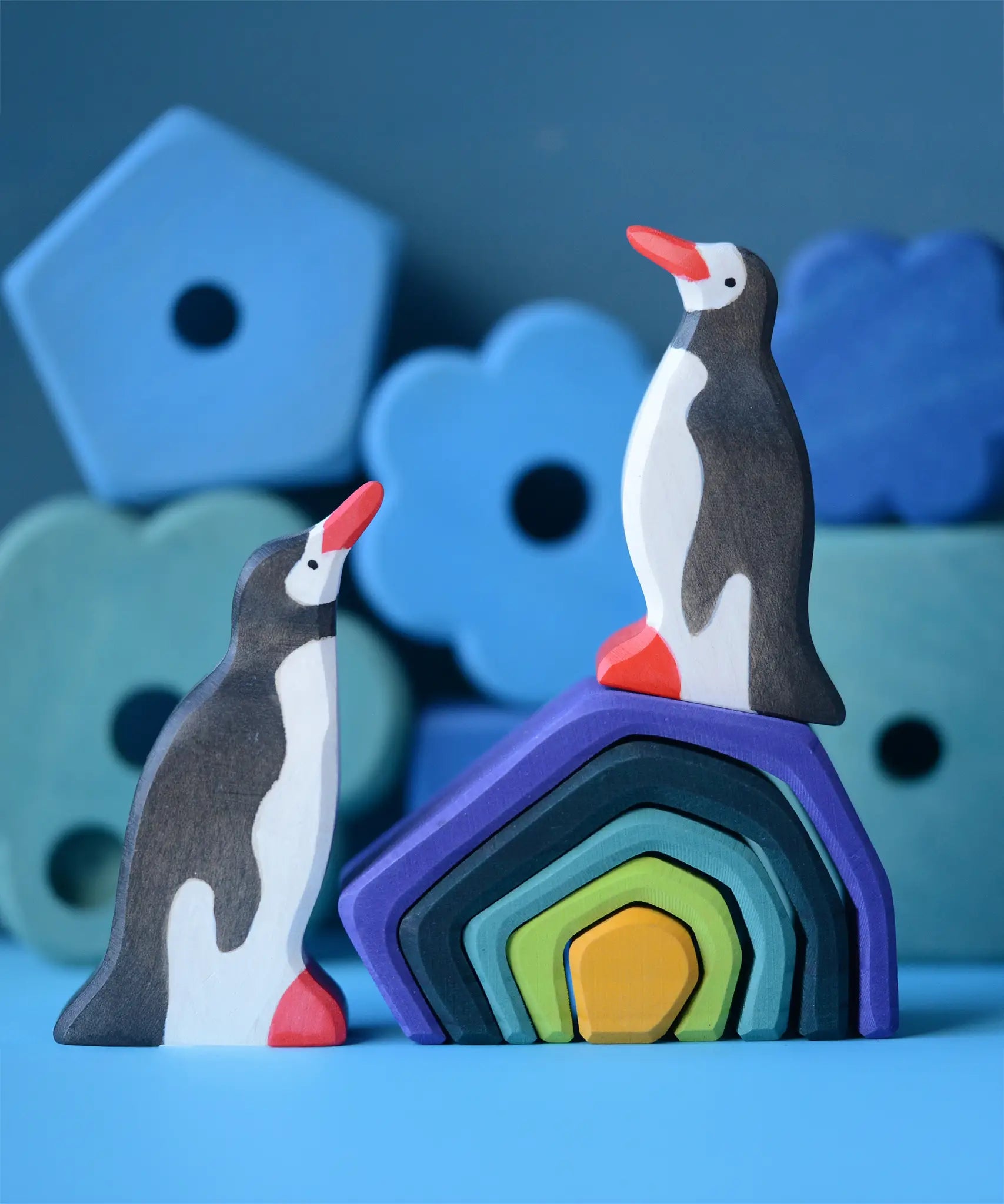 A winter display using a Grimm's small wooden earth set and Holztiger penguin figures