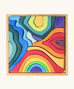 Grimms small elements set showing individual wooden pieces sitting in a frame