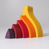 Side of the Grimms handcrafted wooden fire set showing each flame piece slotting into each other 