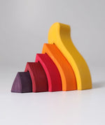 Side of the Grimms handcrafted wooden fire set showing each flame piece slotting into each other 