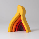 Front of the Grimms handcrafted wooden fire set showing each flame piece slotting into each other 