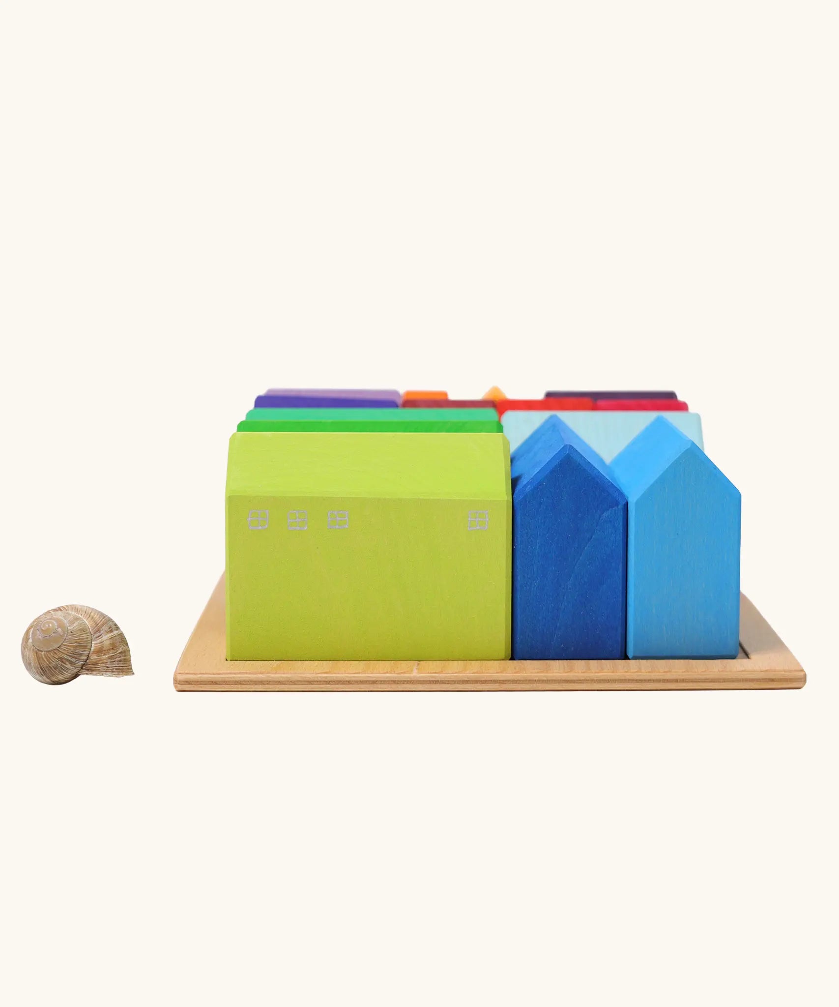 Grimm's small rainbow wooden houses set. 15 different colour houses in various sizes.