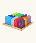Grimm's small rainbow wooden houses set. 15 different colour houses in various sizes.