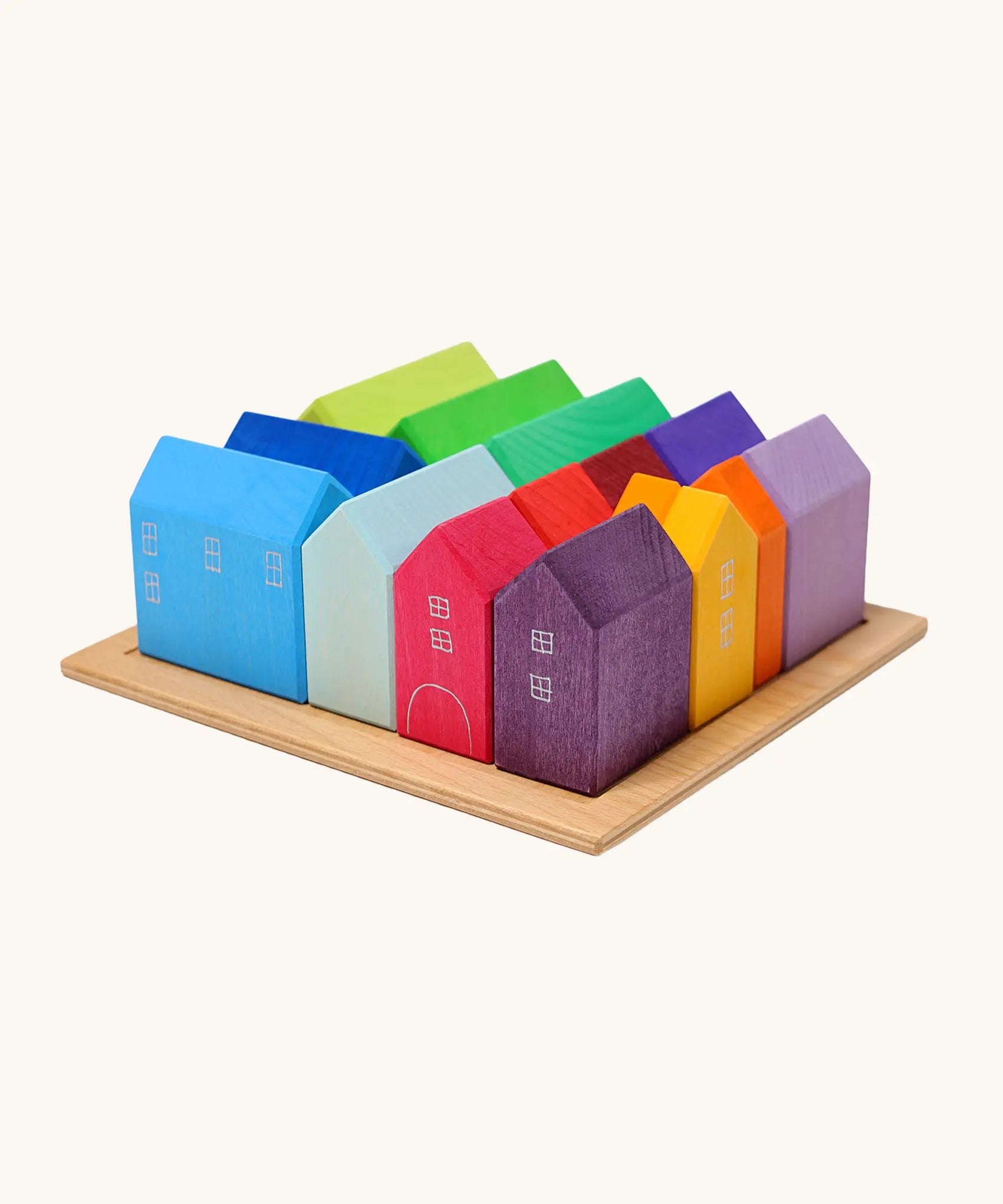 Grimm's small rainbow wooden houses set. 15 different colour houses in various sizes.