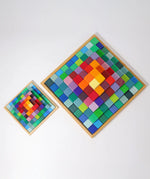 Grimm's Small Stepped Pyramid in a wooden tray next to the large version.