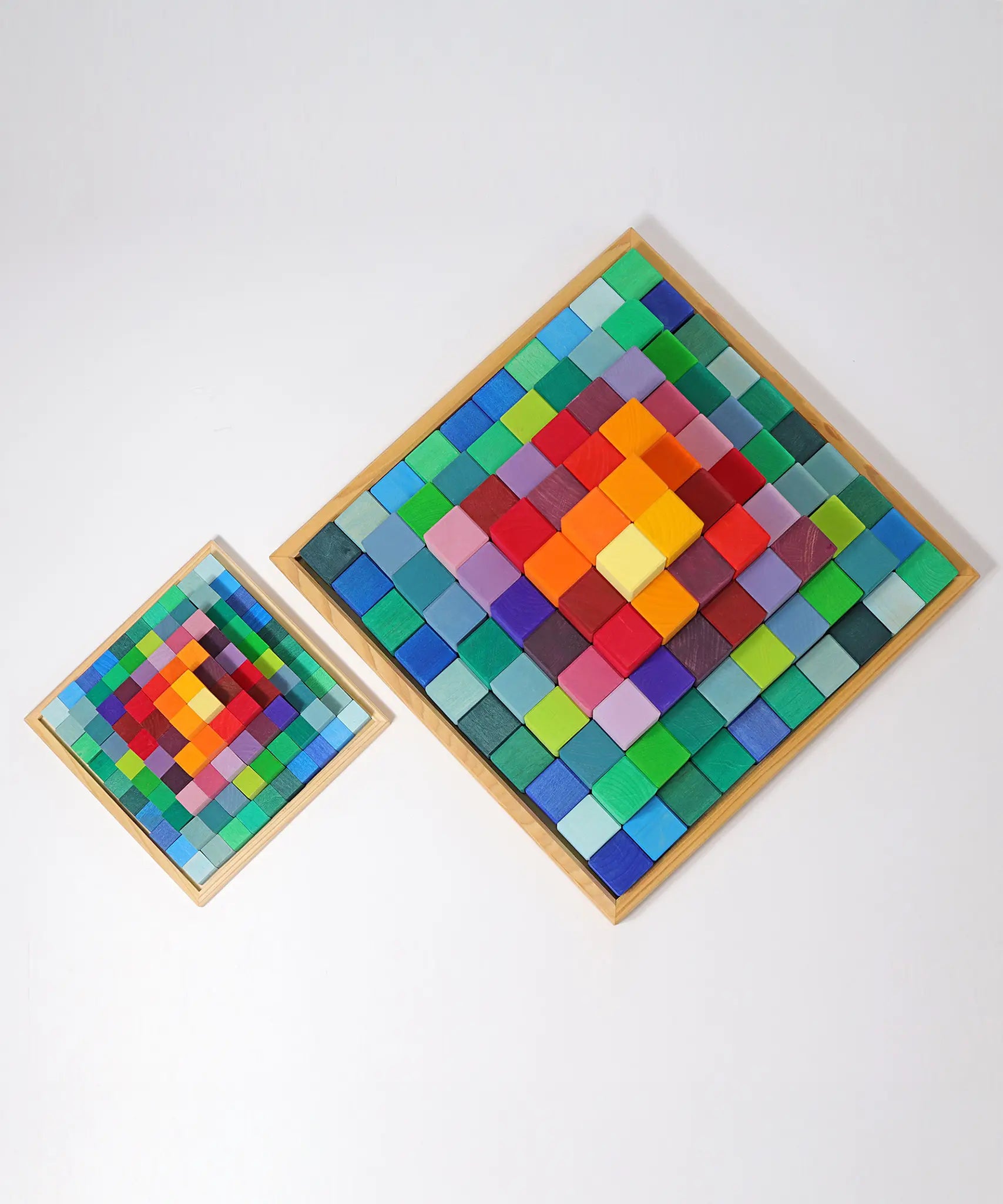 Grimm's Small Stepped Pyramid in a wooden tray next to the large version.