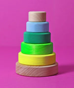 Grimms small handcrafted wooden conical stacking tower in a neon green and natural base, perfect for open ended play