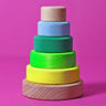 Grimms small handcrafted wooden conical stacking tower in a neon green and natural base, perfect for open ended play