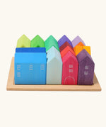 Grimm's small rainbow wooden houses set. 15 different colour houses in various sizes.