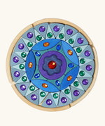 Grimms small sparkling mandala set includes purple and blue pieces in different shapes with jewels and circular frame