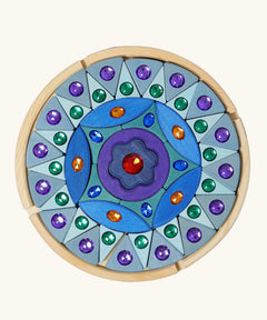 Grimms small sparkling mandala set includes purple and blue pieces in different shapes with jewels and circular frame