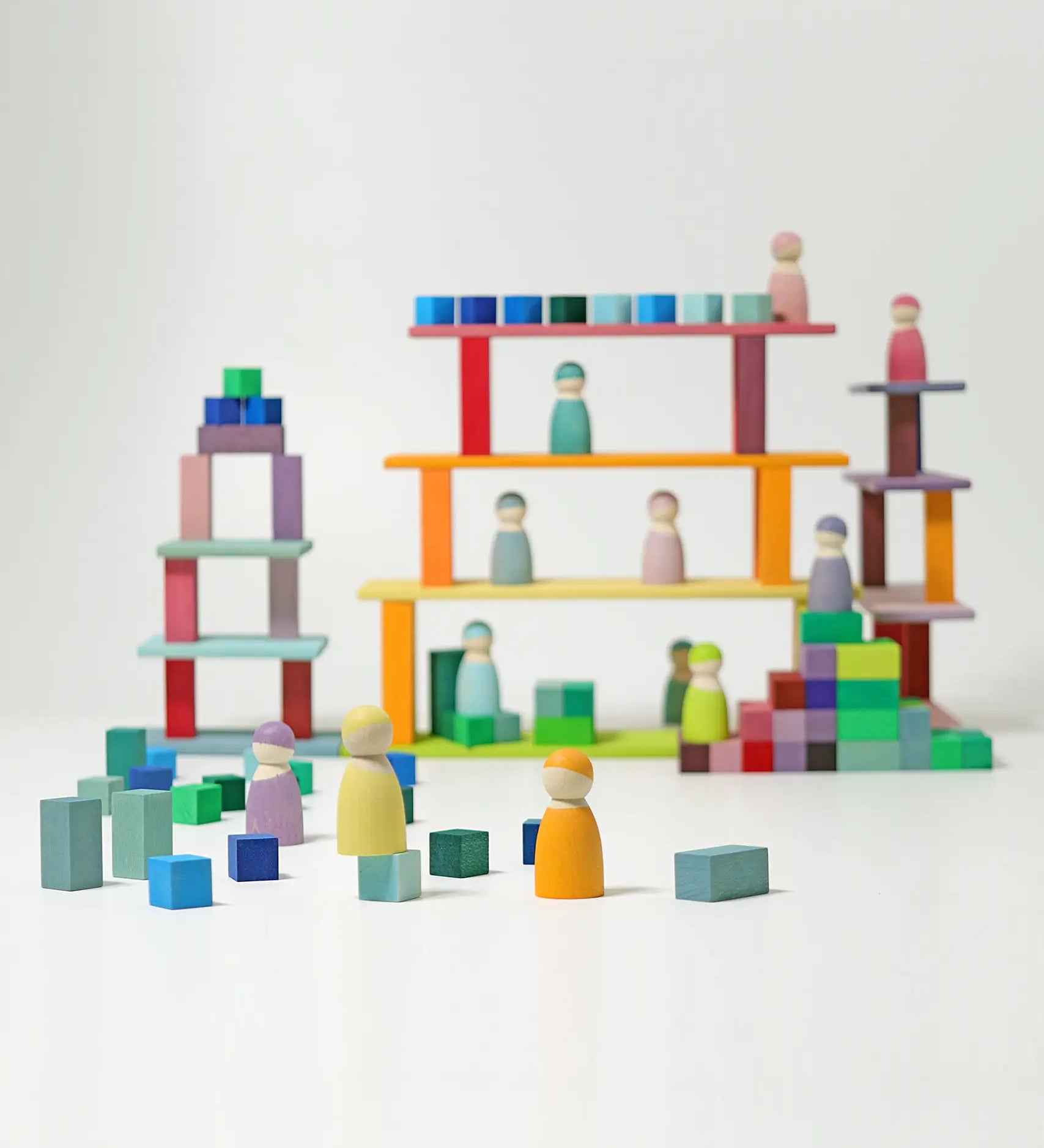 Grimm's Small Stepped Pyramid used to create a build with the Leonardo sticks with friends peg dolls placed on them.